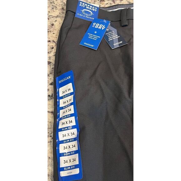 HAGGAR Men's Cool Right Performance Flex Solid Slim Fit Flat Front Pant - Picture 4 of 6